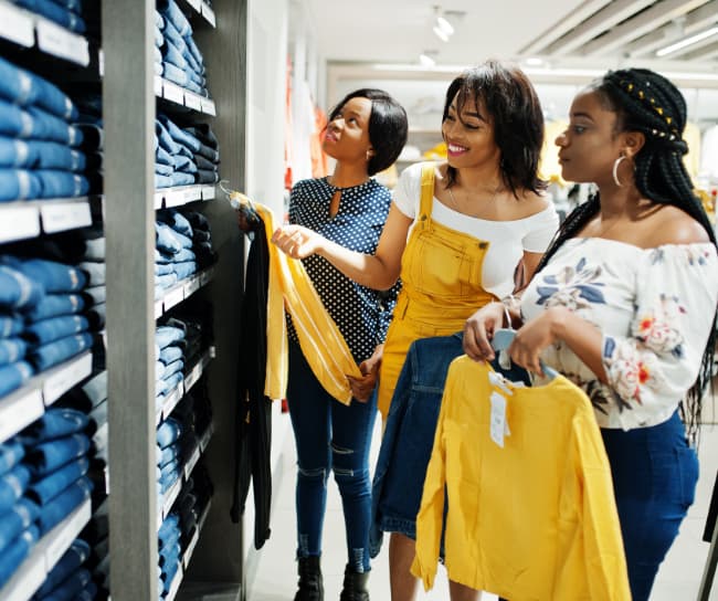 customers looking at clothing in store